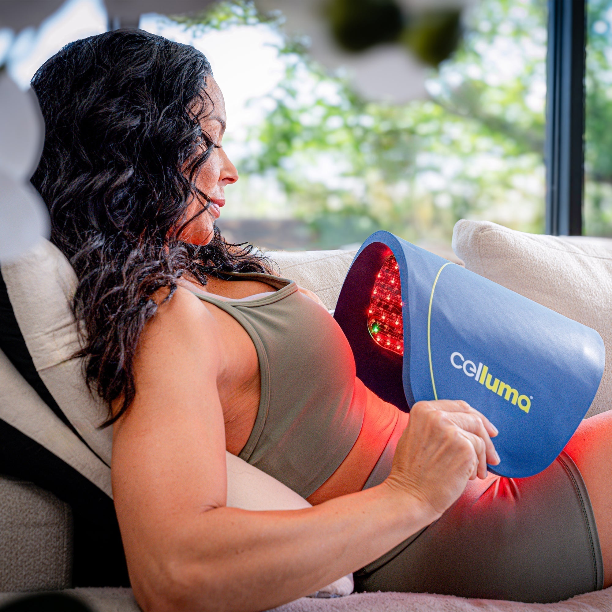 Woman Using Celluma Device