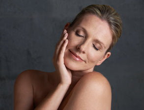 Woman touching her skin