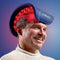 Man wearing the Celluma RESTORE LED light therapy device on top of the head to promote hair growth and restoration.
